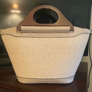 Beautiful, very unique woven structured handbag. Always tons of compliments!